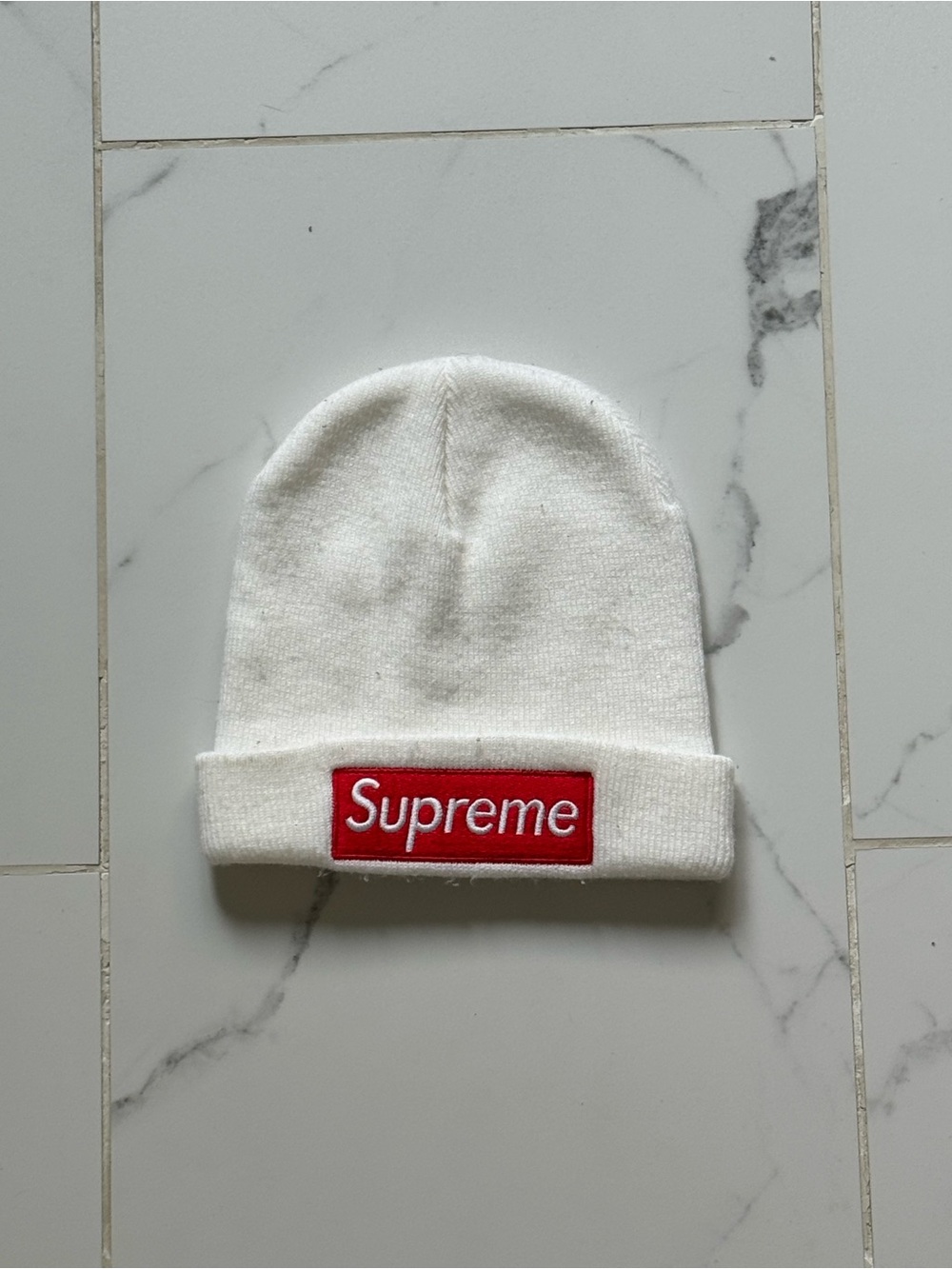 Supreme white knit beanie with red logo patch